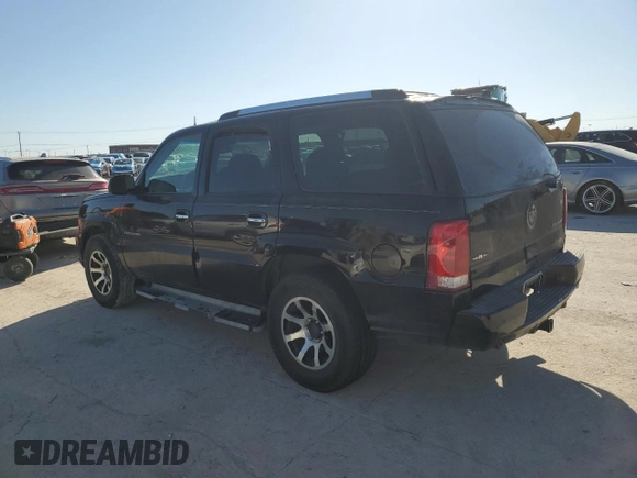 2003 Cadillac Escalade z VIN 1GYEC63T63R317510, wystawiony jako Copart lot #48515195 z przebiegiem 398 303 mil mil oraz Czysty tytuł • Clean title. Historia ofert i sprzedaży dostępna na DreamBid. Obrazek 2.