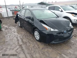 2021 Toyota Prius L Eco with VIN JTDKAMFU5M3145210, listed as a IAAI auction lot 41482234 with 85,600 mi miles. Bid and sale history available at carsss.com. Image 1.