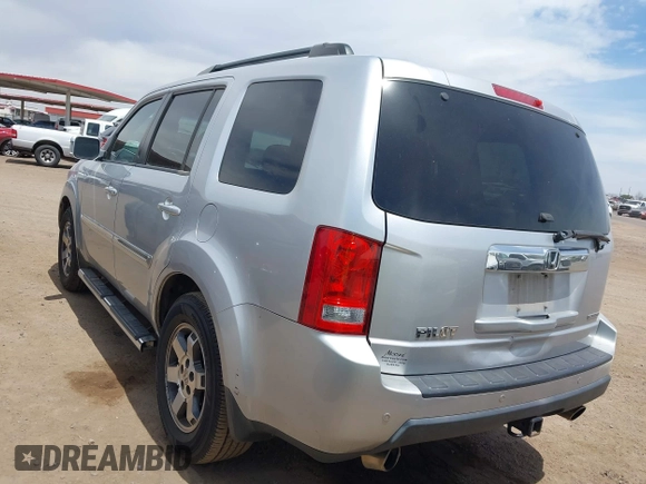 2011 Honda Pilot Touring z VIN 5FNYF3H90BB006634, wystawiony jako IAAI lot #42388390 z przebiegiem 218 475 mil mil oraz . Historia ofert i sprzedaży dostępna na DreamBid. Obrazek 3.