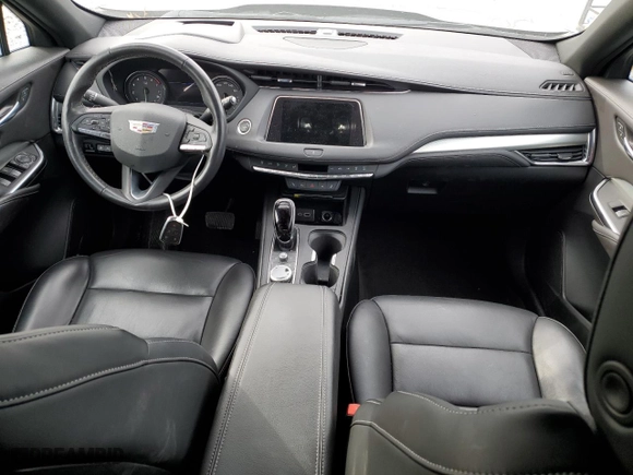 2023 Cadillac XT4 FWD Premium Luxury with VIN 1GYFZCR43PF106063, listed as a Copart auction lot 84091634 with 31,354 mi miles and Salvage Title. Bid and sale history available at carsss.com. Image 8.