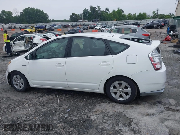 2009 Toyota Prius z VIN JTDKB20U897831736, wystawiony jako IAAI lot #42351310 z przebiegiem 355 571 mil mil oraz . Historia ofert i sprzedaży dostępna na DreamBid. Obrazek 14.