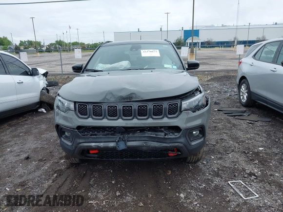 2023 Jeep Compass Trailhawk with VIN 3C4NJDDNXPT562694, listed as a IAAI auction lot 42370873 with 21,988 mi miles and . Bid and sale history available at DreamBid. Image 12.