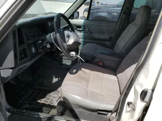 1996 Jeep Cherokee Sport with VIN 1J4FJ68S1TL128597, listed as a Copart auction lot 49600545 with 201,074 mi miles and Salvage title. Bid and sale history available at DreamBid. Image 7.