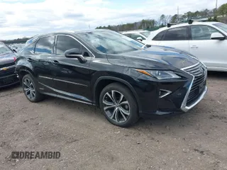 2018 Lexus RX with VIN 2T2BGMCA0JC024236, listed as a IAAI auction lot 42032485 with 105,046 mi miles. Bid and sale history available at carsss.com. Image 1.