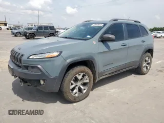 2014 Jeep Cherokee Trailhawk with VIN 1C4PJMBS0EW185737, listed as a Copart auction lot 63463015 with 199,983 mi miles and Clean title. Bid and sale history available at DreamBid. Image 1.