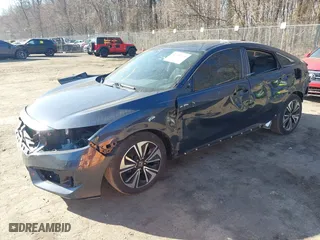 2016 Honda Civic Sedan EX-T with VIN 19XFC1F3XGE216013, listed as a IAAI auction lot 41765239 with 76,620 mi miles. Bid and sale history available at carsss.com. Image 22.