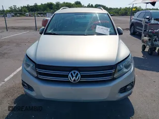 2012 Volkswagen Tiguan SE with VIN WVGAV7AX9CW581957, listed as a IAAI auction lot 42407148 with 135,553 mi miles and . Bid and sale history available at DreamBid. Image 6.