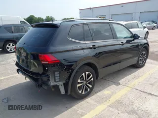 2024 Volkswagen Tiguan S with VIN 3VVRB7AX4RM201384, listed as a IAAI auction lot 42401212 with 11,986 mi miles and . Bid and sale history available at DreamBid. Image 4.