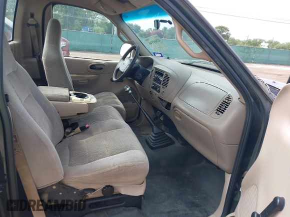 2001 Ford F-150 XL with VIN 3FTZF17271MA82150, listed as a IAAI auction lot 42664544 with 199,156 mi miles and . Bid and sale history available at DreamBid. Image 5.