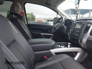 2017 Nissan Titan XD PRO-4X with VIN 1N6BA1F47HN517135, listed as a IAAI auction lot 41605323 with 108,984 mi miles. Bid and sale history available at carsss.com. Image 5.
