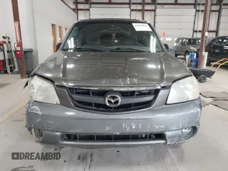 2002 Mazda Tribute LX with VIN 4F2CU08132KM39554, listed as a IAAI auction lot 42015060 with 99,128 mi miles and . Bid and sale history available at carsss.com. Image 12.