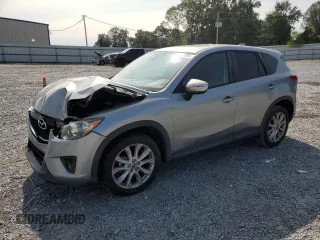 2015 Mazda CX-5 Grand Touring with VIN JM3KE4DY8F0540181, listed as a Copart auction lot 70624394 with 119,420 mi miles and Salvage Title. Bid and sale history available at carsss.com. Image 1.