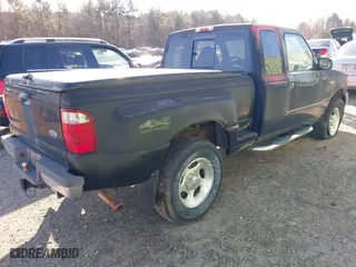 2001 Ford Ranger XL Fleet with VIN 1FTZR15U01PA42952, listed as a IAAI auction lot 41511355 with 143,544 mi miles. Bid and sale history available at carsss.com. Image 4.