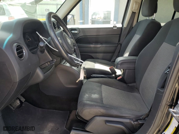 2014 Jeep Patriot Latitude with VIN 1C4NJRFBXED898378, listed as a Copart auction lot 50497675 with 179,485 mi miles and Clean Title. Bid and sale history available at carsss.com. Image 7.