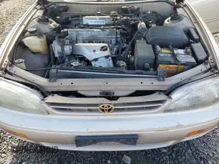 1996 Toyota Camry DX with VIN JT2BG12K0T0343249, listed as a Copart auction lot 45244435 with 179,986 mi miles and Salvage Title. Bid and sale history available at carsss.com. Image 11.