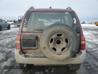 1999 Suzuki Grand Vitara JLX z VIN JS3TD62V6X4108950, wystawiony jako Copart lot #46468705 z przebiegiem 215 541 mil mil oraz Szkoda całkowita • Salvage title. Historia ofert i sprzedaży dostępna na DreamBid. Obrazek 6.