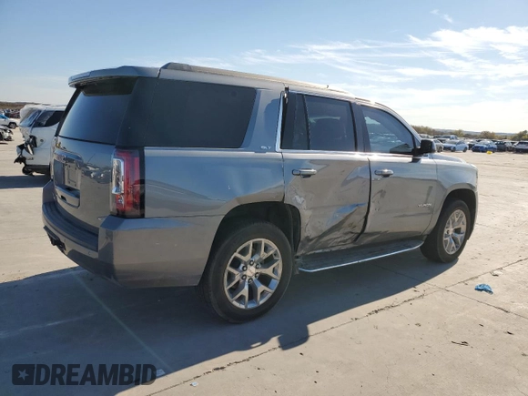 2019 GMC Yukon SLT Standard Edition with VIN 1GKS2DKC3KR134022, listed as a Copart auction lot 83202344 with 201,621 mi miles and Salvage Title. Bid and sale history available at carsss.com. Image 3.