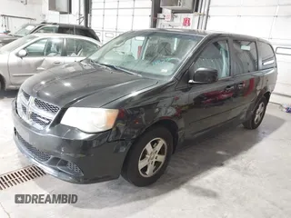2013 Dodge Grand Caravan SXT with VIN 2C4RDGCG2DR527482, listed as a IAAI auction lot 42199622 with 198,248 mi miles and . Bid and sale history available at DreamBid. Image 2.