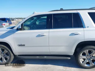 2018 Chevrolet Tahoe LT with VIN 1GNSCBKC7JR101043, listed as a IAAI auction lot 42192481 with 152,831 mi miles and . Bid and sale history available at DreamBid. Image 14.