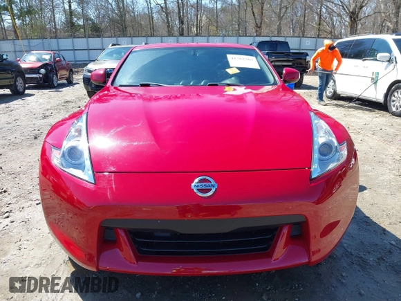 2009 Nissan 370Z Touring with VIN JN1AZ44E69M405179, listed as a IAAI auction lot 41762303 with 132,853 mi miles and . Bid and sale history available at DreamBid. Image 13.