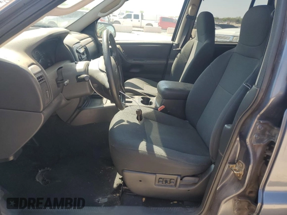 2003 Jeep Grand Cherokee Laredo with VIN 1J4GX48S83C504543, listed as a Copart auction lot 52723835 with 220,574 mi miles and Clean Title. Bid and sale history available at carsss.com. Image 7.