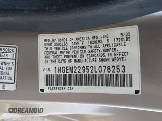 2002 Honda Civic EX with VIN 1HGEM22952L076253, listed as a IAAI auction lot 42134965 with 114,819 mi miles. Bid and sale history available at carsss.com. Image 9.