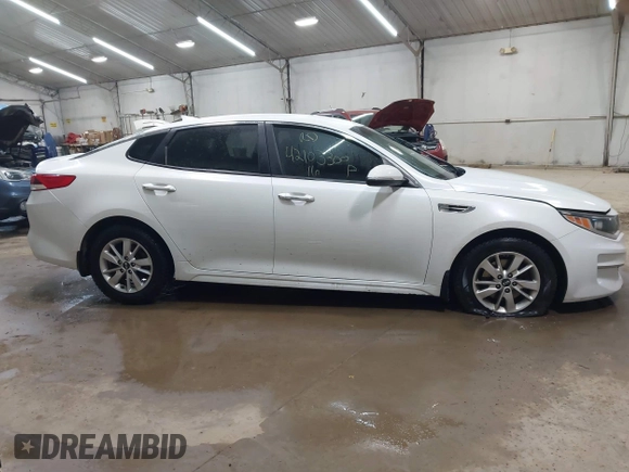 2016 Kia Optima LX with VIN 5XXGT4L39GG048740, listed as a IAAI auction lot 42103300 with 111,574 mi miles and . Bid and sale history available at DreamBid. Image 13.