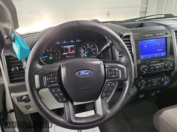2020 Ford F-150 XL with VIN 1FTFX1E47LKD47695, listed as a IAAI auction lot 42013652 with 83,466 mi miles. Bid and sale history available at carsss.com. Image 1.