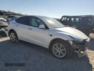 2022 Tesla Model Y Long Range z VIN 7SAYGDEE0NF339363, wystawiony jako Copart lot #44604015 z przebiegiem 48 002 mil mil oraz Szkody całkowita. Historia ofert i sprzedaży dostępna na DreamBid. Obrazek 4.