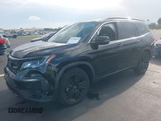 2022 Honda Pilot Special Edition with VIN 5FNYF5H25NB026414, listed as a IAAI auction lot 42590493 with 26,600 mi miles and . Bid and sale history available at DreamBid. Image 17.