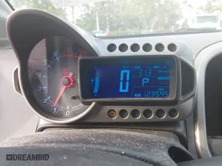 2015 Chevrolet Sonic LT with VIN 1G1JC6SH2F4161722, listed as a IAAI auction lot 41737818 with 123,595 mi miles. Bid and sale history available at carsss.com. Image 7.