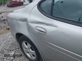 2006 Pontiac Grand Prix z VIN 2G2WP582461300179, wystawiony jako IAAI lot #42356282 z przebiegiem 257 639 mil mil oraz . Historia ofert i sprzedaży dostępna na DreamBid. Obrazek 6.