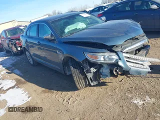 2010 Ford Taurus Limited z VIN 1FAHP2JWXAG148779, wystawiony jako IAAI lot #41414286 z przebiegiem 121 397 mil mil oraz . Historia ofert i sprzedaży dostępna na DreamBid. Obrazek 1.