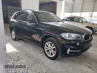 2014 BMW X5 sDrive35i with VIN 5UXKR2C57E0H31227, listed as a Copart auction lot 53047355 with 119,920 mi miles and Clean Title. Bid and sale history available at carsss.com. Image 4.
