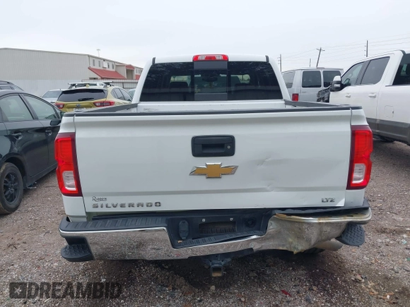2017 Chevrolet Silverado 1500 LTZ with VIN 3GCPCSEC1HG448307, listed as a IAAI auction lot 41349956 with 121,144 mi miles and . Bid and sale history available at DreamBid. Image 16.