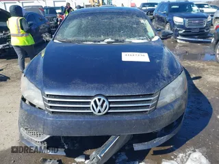 2012 Volkswagen Passat SE with VIN 1VWBP7A38CC034225, listed as a IAAI auction lot 41617236 with 188,995 mi miles and . Bid and sale history available at DreamBid. Image 13.