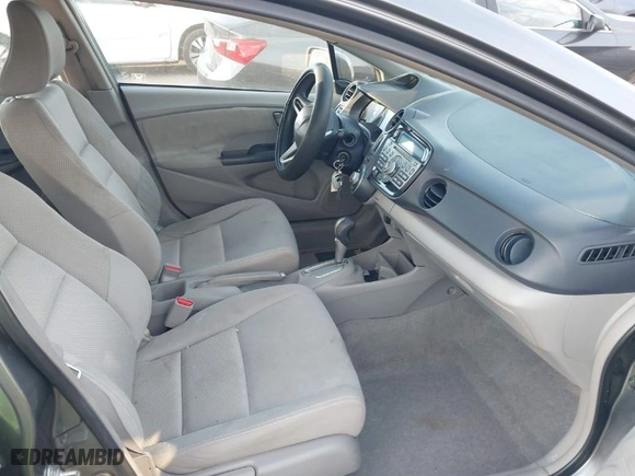 2010 Honda Insight LX with VIN JHMZE2H52AS014667, listed as a IAAI auction lot 41258620 with 138,419 mi miles. Bid and sale history available at carsss.com. Image 5.