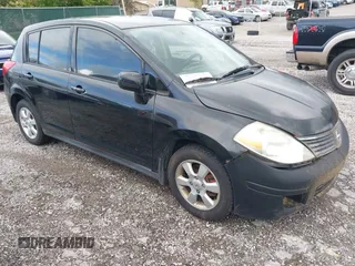 2009 Nissan Versa 1.8 S with VIN 3N1BC13E79L354341, listed as a IAAI auction lot 42079896 with 118,797 mi miles. Bid and sale history available at carsss.com. Image 1.
