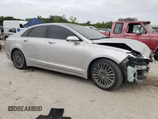 2014 Lincoln MKZ z VIN 3LN6L2JK3ER813137, wystawiony jako Copart lot #48230835 z przebiegiem 135 538 mil mil oraz Czysty tytuł • Clean title. Historia ofert i sprzedaży dostępna na DreamBid. Obrazek 4.