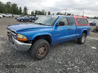 1998 Dodge Dakota SLT with VIN 1B7GG22Y2WS597545, listed as a Copart auction lot 70877014 with 261,522 mi miles and Salvage Title. Bid and sale history available at carsss.com. Image 1.