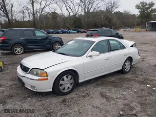 2002 Lincoln LS w/Base Pkg with VIN 1LNHM87A32Y663213, listed as a IAAI auction lot 41366143 with 216,118 mi miles. Bid and sale history available at carsss.com. Image 17.