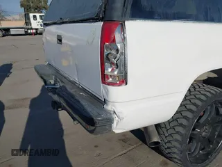 1997 GMC Yukon with VIN 1GKEK13R9VJ741768, listed as a IAAI auction lot 41692027 with 200,681 mi miles. Bid and sale history available at carsss.com. Image 6.