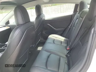 2020 Tesla Model 3 Long Range with VIN 5YJ3E1EB6LF637298, listed as a IAAI auction lot 42248639 with 69,867 mi miles and . Bid and sale history available at DreamBid. Image 1.