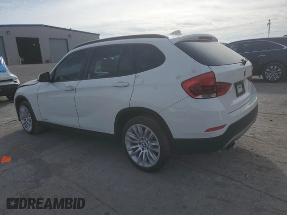 2015 BMW X1 sDrive28i with VIN WBAVM1C50FV498720, listed as a Copart auction lot 80381264 with 0 mi miles and Salvage Title. Bid and sale history available at carsss.com. Image 2.