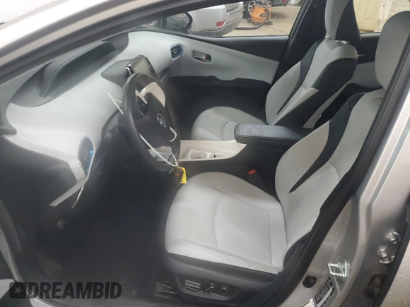 2017 Toyota Prius Plus z VIN JTDKARFP9H3034575, wystawiony jako Copart lot #57501125 z przebiegiem 82 647 mil mil oraz Szkoda całkowita • Salvage title. Historia ofert i sprzedaży dostępna na DreamBid. Obrazek 7.