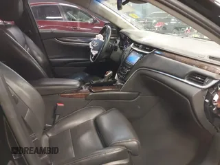 2013 Cadillac XTS Luxury z VIN 2G61R5S34D9102625, wystawiony jako IAAI lot #41668752 z przebiegiem 112 065 mil mil oraz . Historia ofert i sprzedaży dostępna na DreamBid. Obrazek 5.