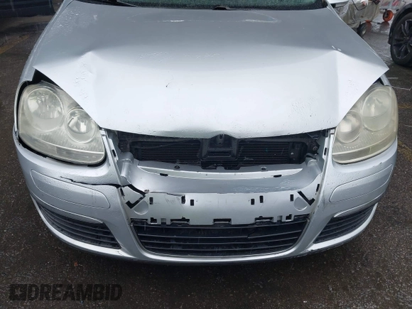 2009 Volkswagen Jetta S z VIN 3VWJZ71K29M148712, wystawiony jako IAAI lot #41724523 z przebiegiem 112 043 mil mil oraz . Historia ofert i sprzedaży dostępna na DreamBid. Obrazek 6.
