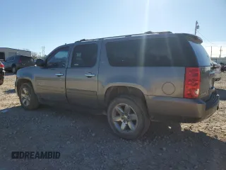 2012 GMC Yukon XL SLT with VIN 1GKS2KE72CR279315, listed as a Copart auction lot 87589195 with 220,584 mi miles and Salvage Title. Bid and sale history available at carsss.com. Image 2.