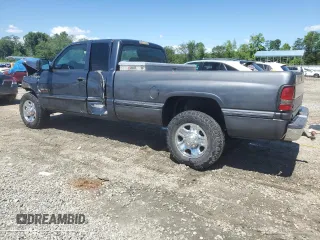 2002 Dodge Ram 2500 with VIN 3B7KC236X2M268324, listed as a Copart auction lot 57196344 with 179,647 mi miles and Salvage Title. Bid and sale history available at carsss.com. Image 2.