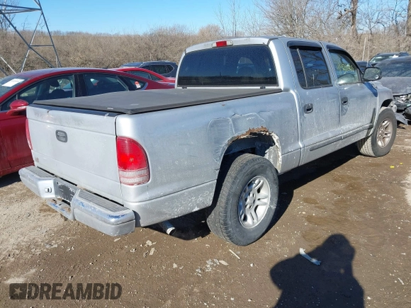 2001 Dodge Dakota Sport with VIN 1B7HL2AN51S310862, listed as a IAAI auction lot 41436565 with 152,425 mi miles. Bid and sale history available at carsss.com. Image 4.
